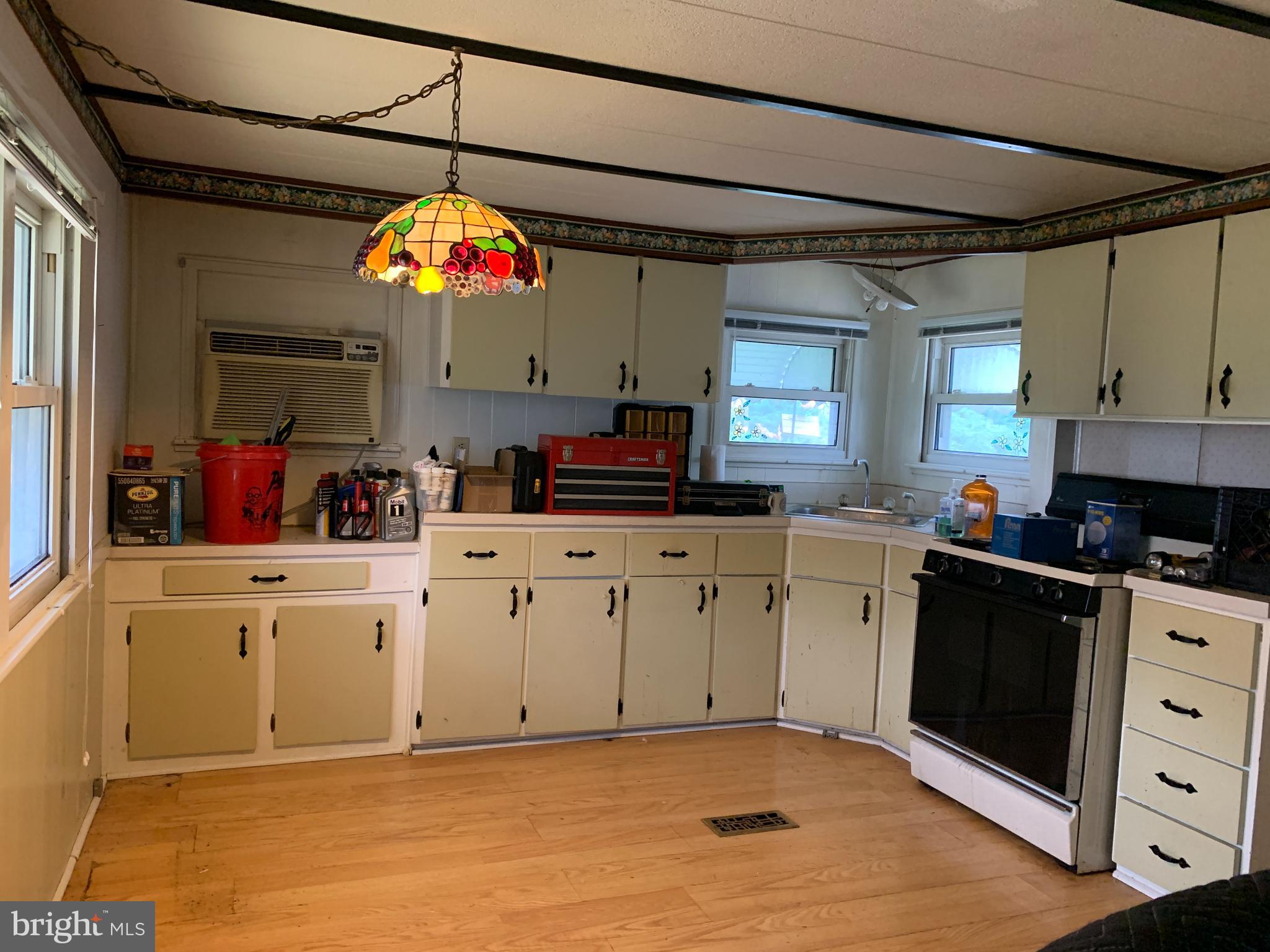 200 Anderson Avenue Media, PA 19063 - Photo 12 of 28 a kitchen with cabinets and window