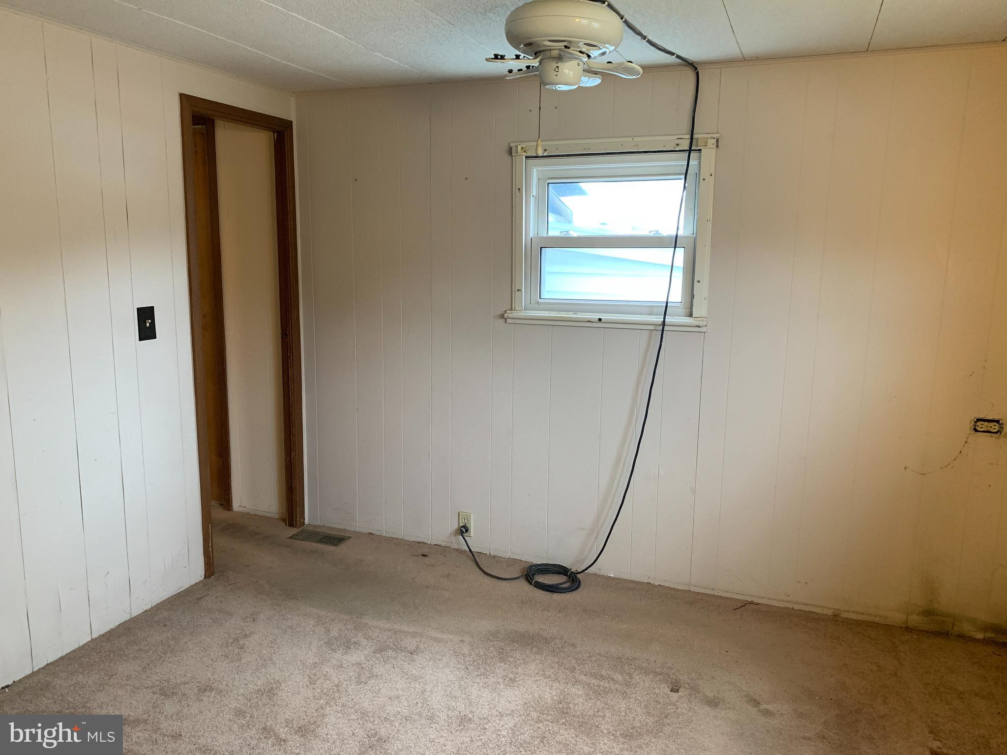 200 Anderson Avenue Media, PA 19063 - Photo 19 of 28 an empty room with chandelier fan