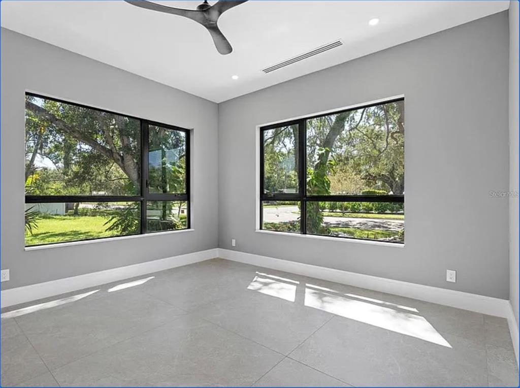 2467 Hyde Park Street Sarasota, FL 34239 - Photo 23 of 42 a view of an empty room with a window