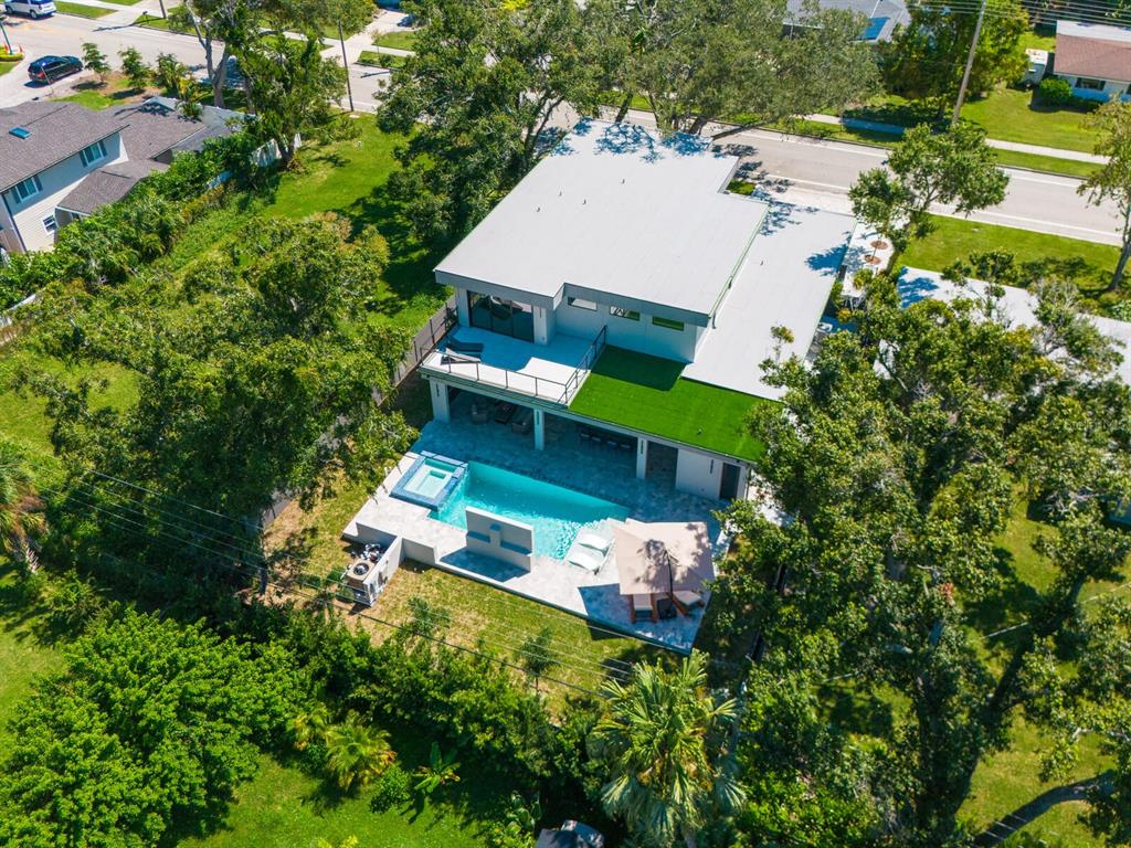 2467 Hyde Park Street Sarasota, FL 34239 - Photo 31 of 42 an aerial view of a house with swimming pool and outdoor seating