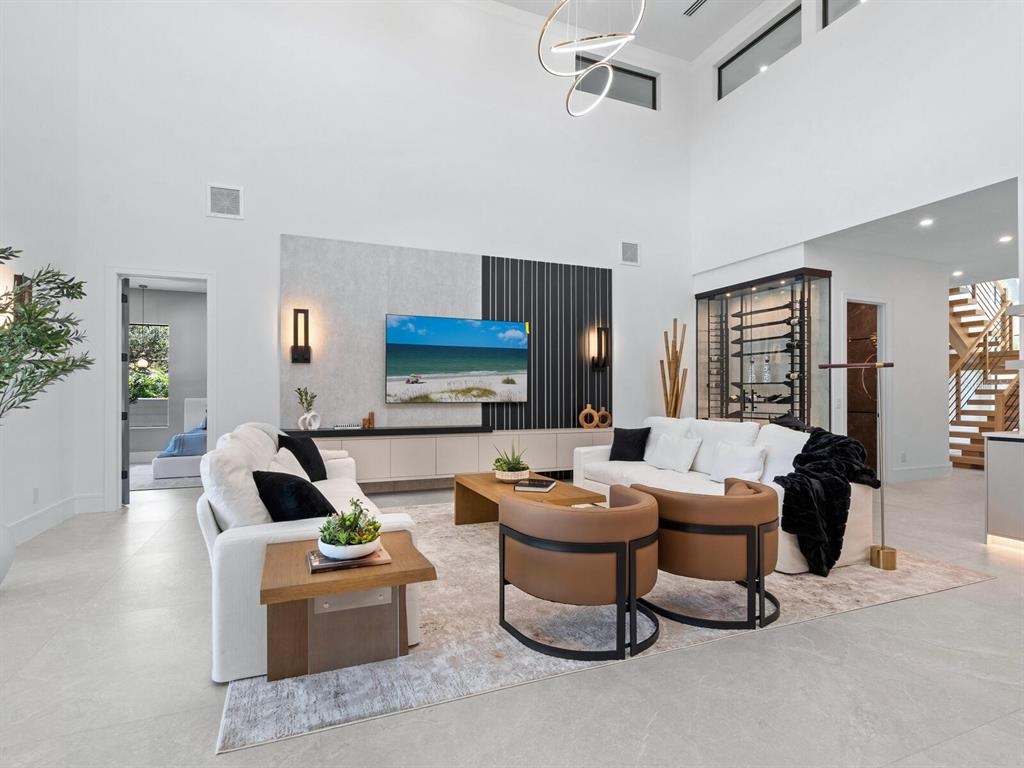 2467 Hyde Park Street Sarasota, FL 34239 - Photo 6 of 42 a living room with furniture and a couch