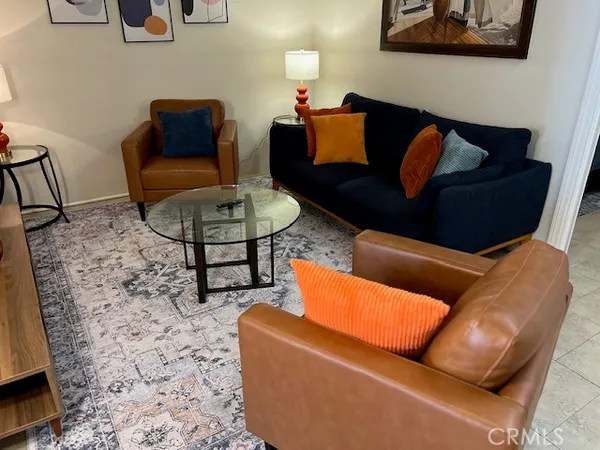 a living room with furniture and a couch