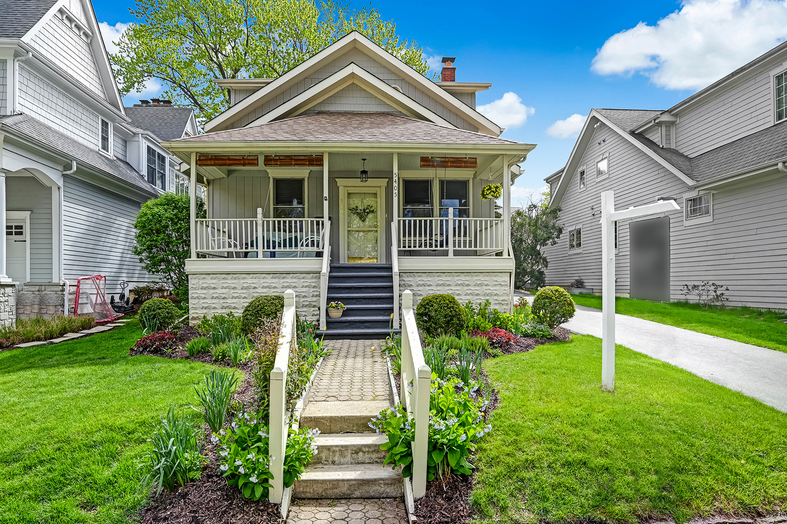 5405 Fairmount Avenue Downers Grove, IL 60515 - Photo 1 of 27 a front view of a house with a yard