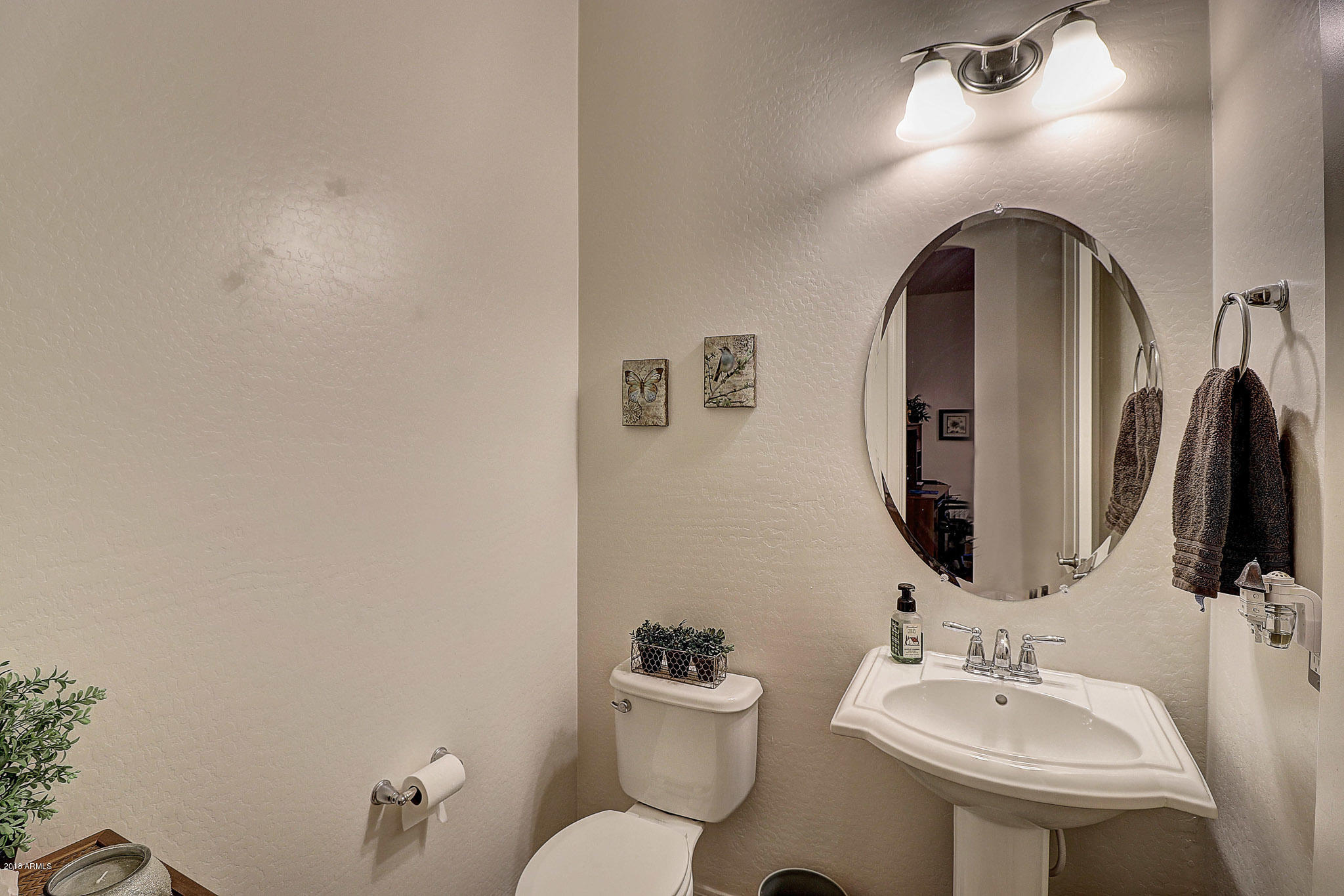 18271 West Desert Trumpet Road Goodyear, AZ 85338 - Photo 23 of 49 Convenient Guest Half Bath