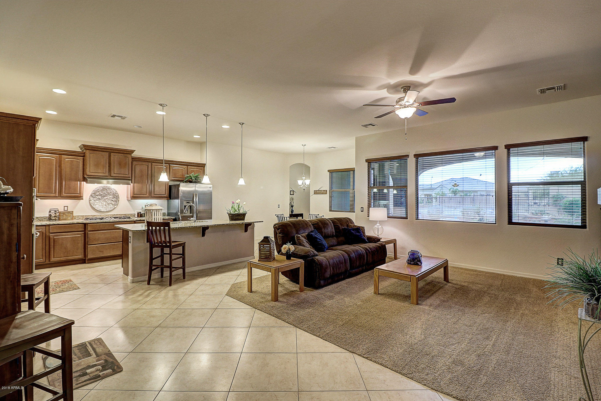 18271 West Desert Trumpet Road Goodyear, AZ 85338 - Photo 49 of 49 Open Floor Plan Makes Entertaining Easy