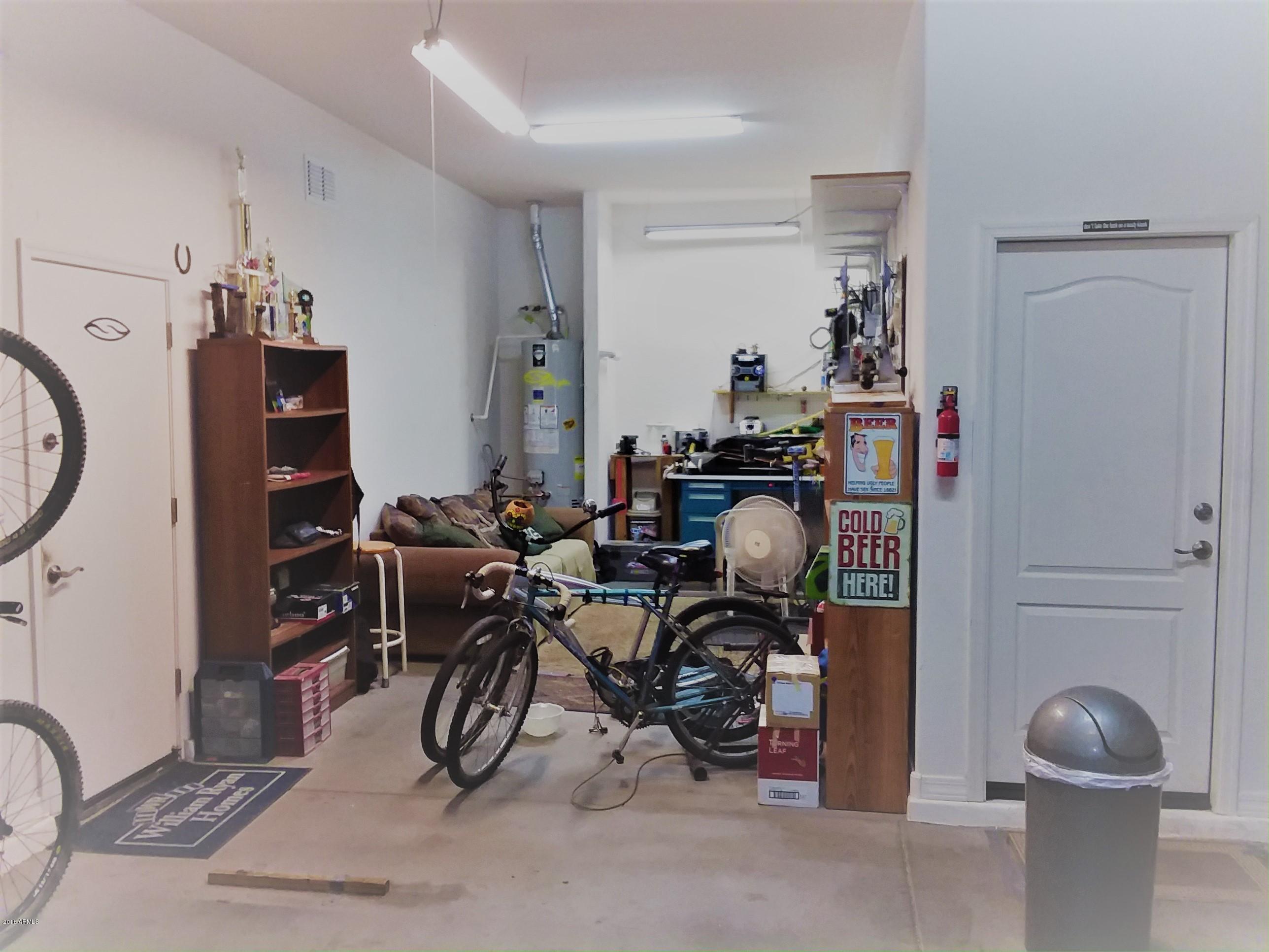 18271 West Desert Trumpet Road Goodyear, AZ 85338 - Photo 43 of 49 Stacked 3rd_Car_Bike_Garage