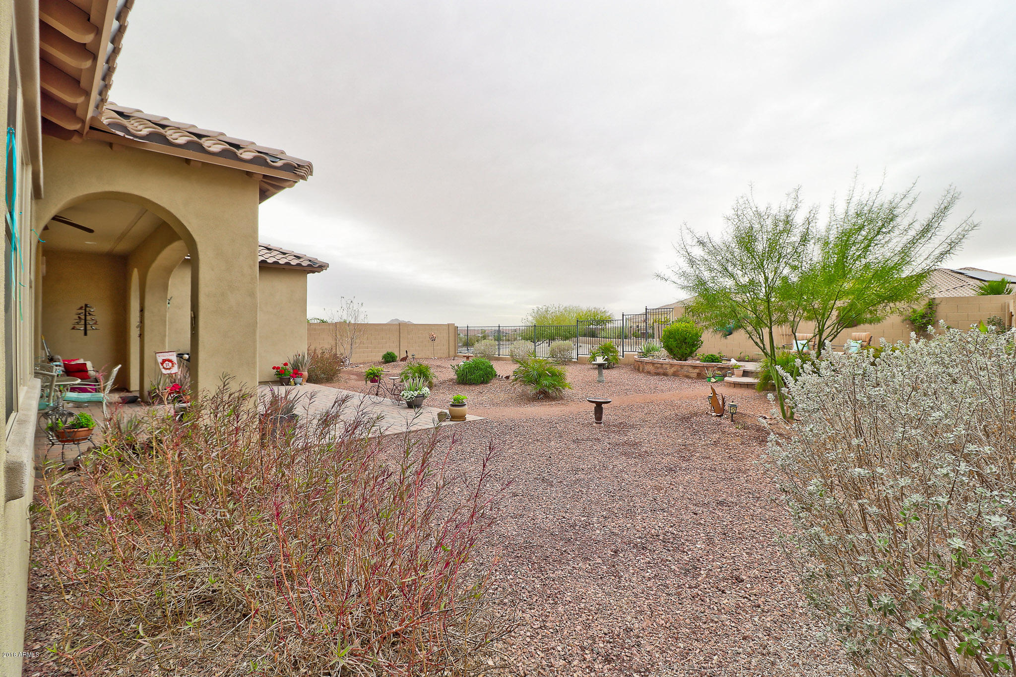 18271 West Desert Trumpet Road Goodyear, AZ 85338 - Photo 45 of 49 Covered & Extended Paver Patio Area
