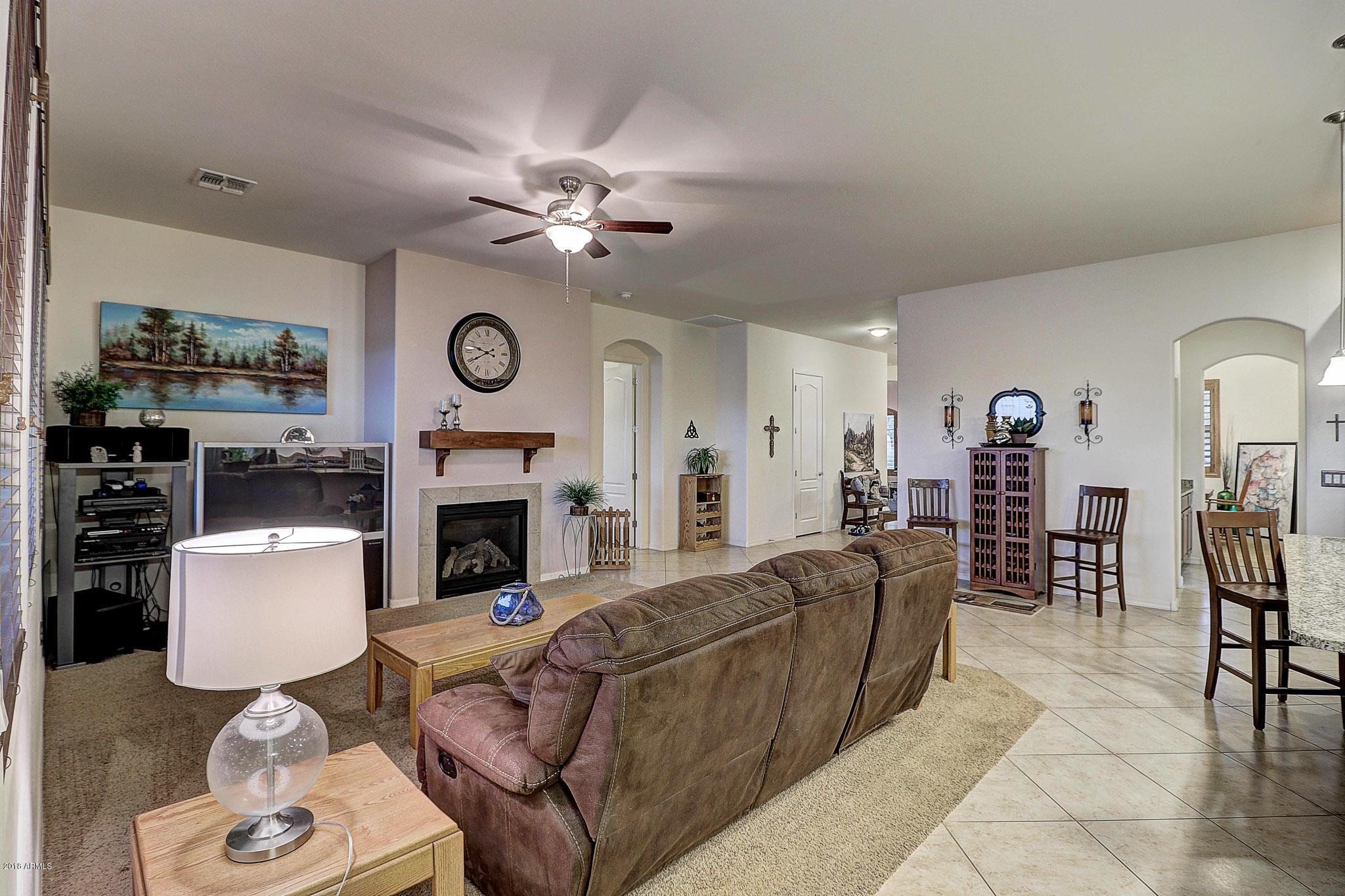 18271 West Desert Trumpet Road Goodyear, AZ 85338 - Photo 6 of 49 Entertainment Center & Gas Fireplace