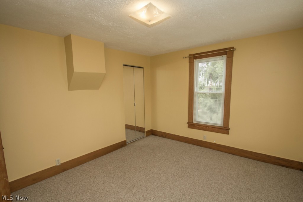 7688 York Road Cleveland, OH 44130 - Photo 9 of 22 1st floor bedroom with large walk-in closet
