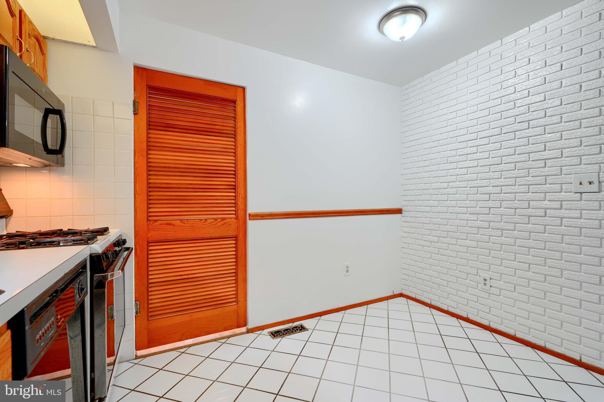 4425 Wynn Road Baltimore, MD 21236 - Photo 13 of 39 a view of an empty kitchen