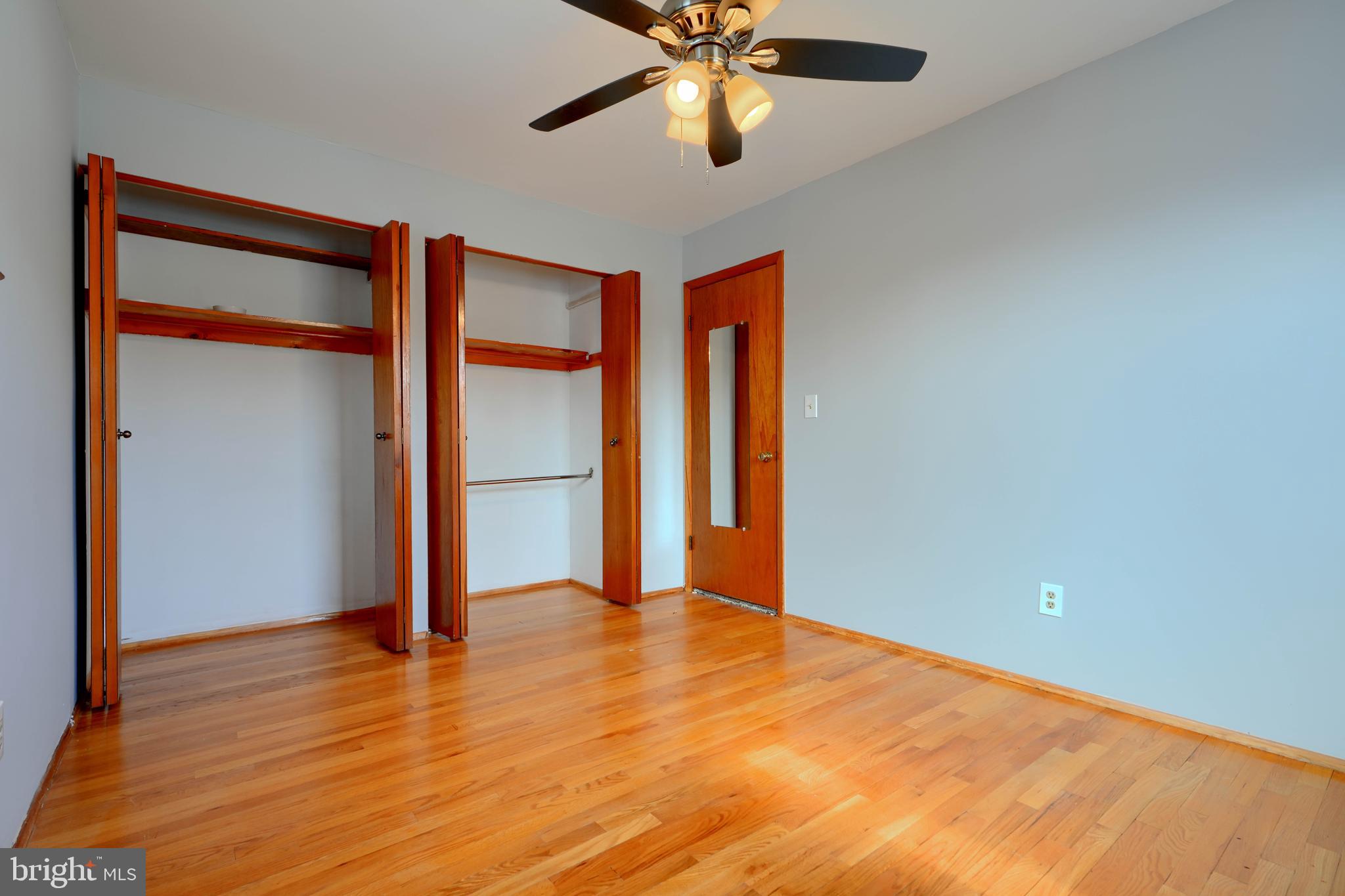 4425 Wynn Road Baltimore, MD 21236 - Photo 21 of 39 wooden floor in an empty room with a window
