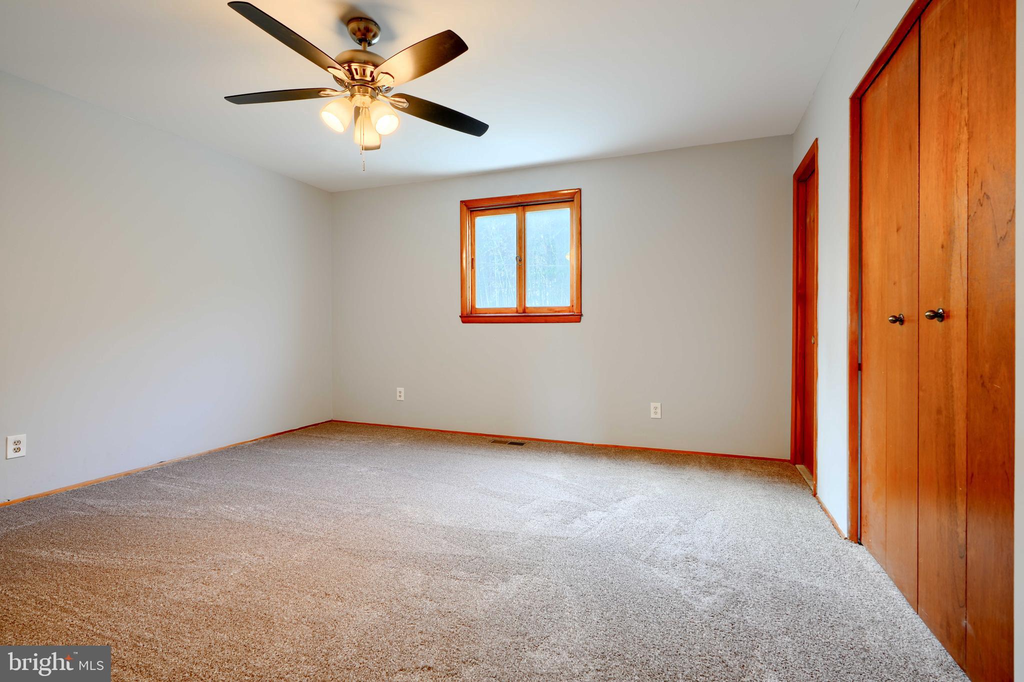 4425 Wynn Road Baltimore, MD 21236 - Photo 25 of 39 a view of an empty room with a window
