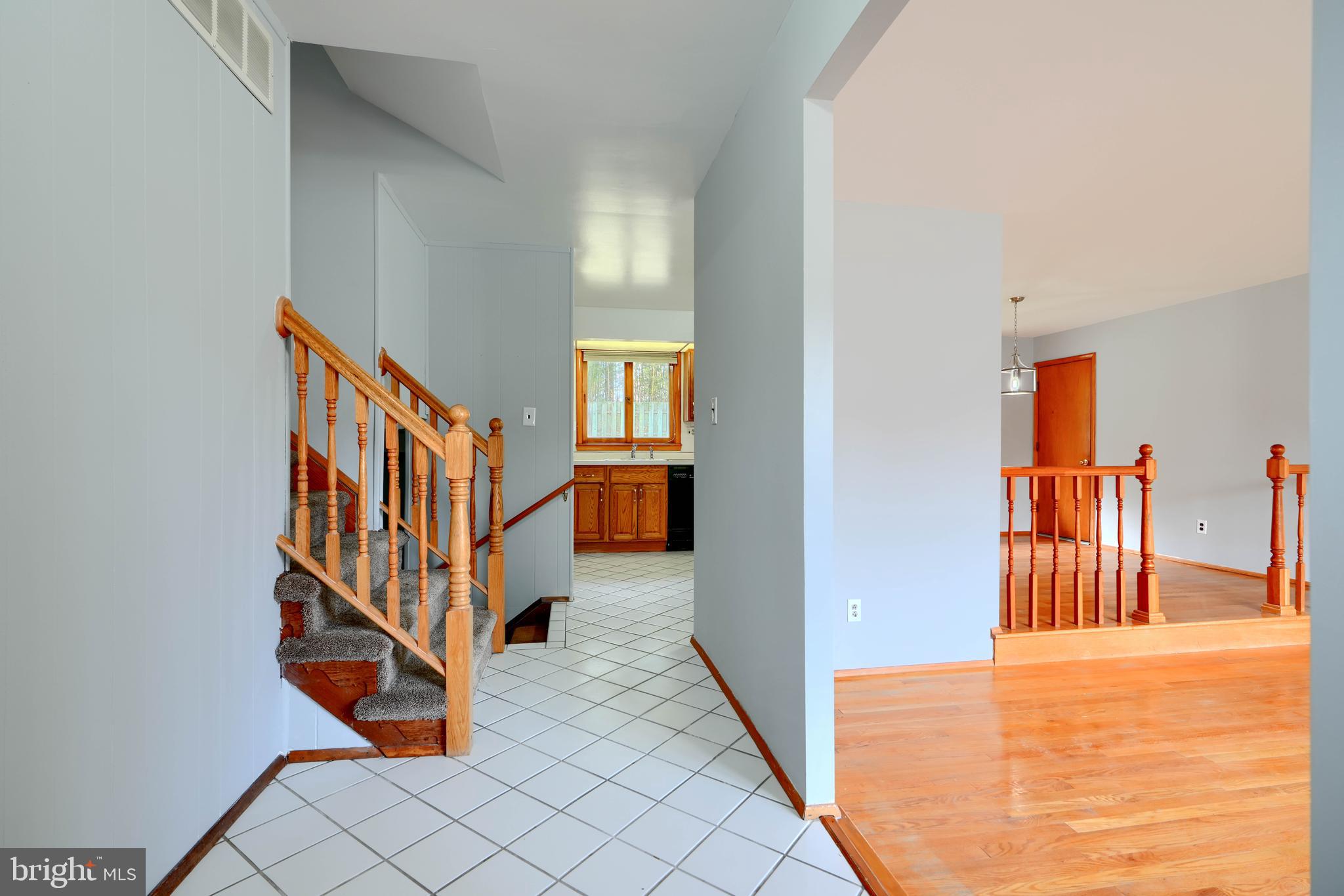 4425 Wynn Road Baltimore, MD 21236 - Photo 3 of 39 a view of a hallway with staircase