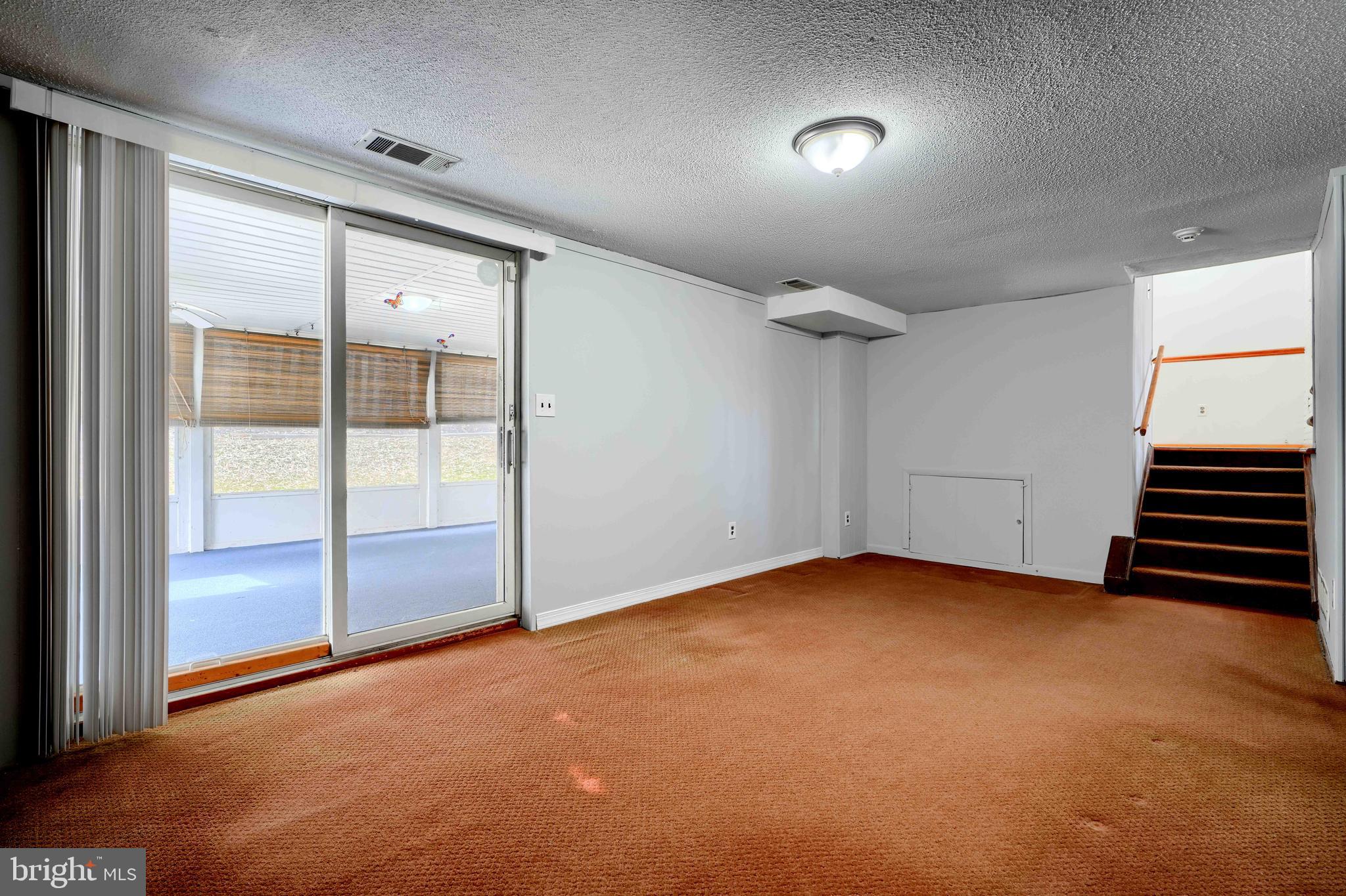4425 Wynn Road Baltimore, MD 21236 - Photo 33 of 39 an empty room with windows