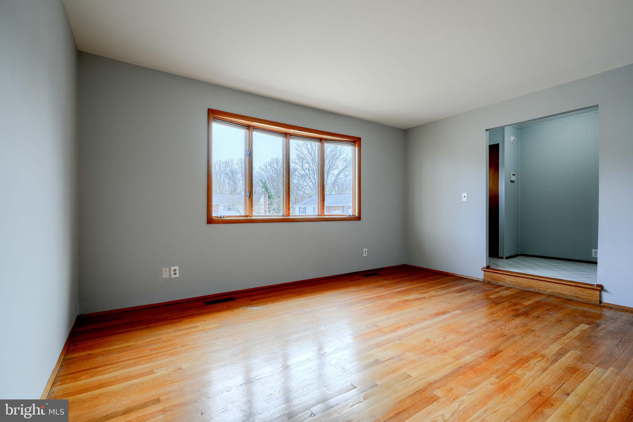 4425 Wynn Road Baltimore, MD 21236 - Photo 6 of 39 an empty room with windows