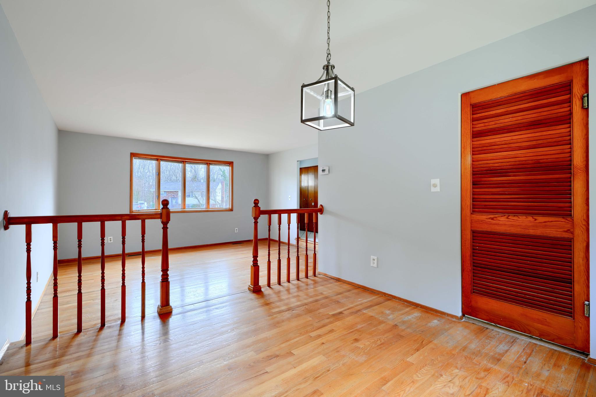 4425 Wynn Road Baltimore, MD 21236 - Photo 9 of 39 a view of empty room with wooden floor and fan