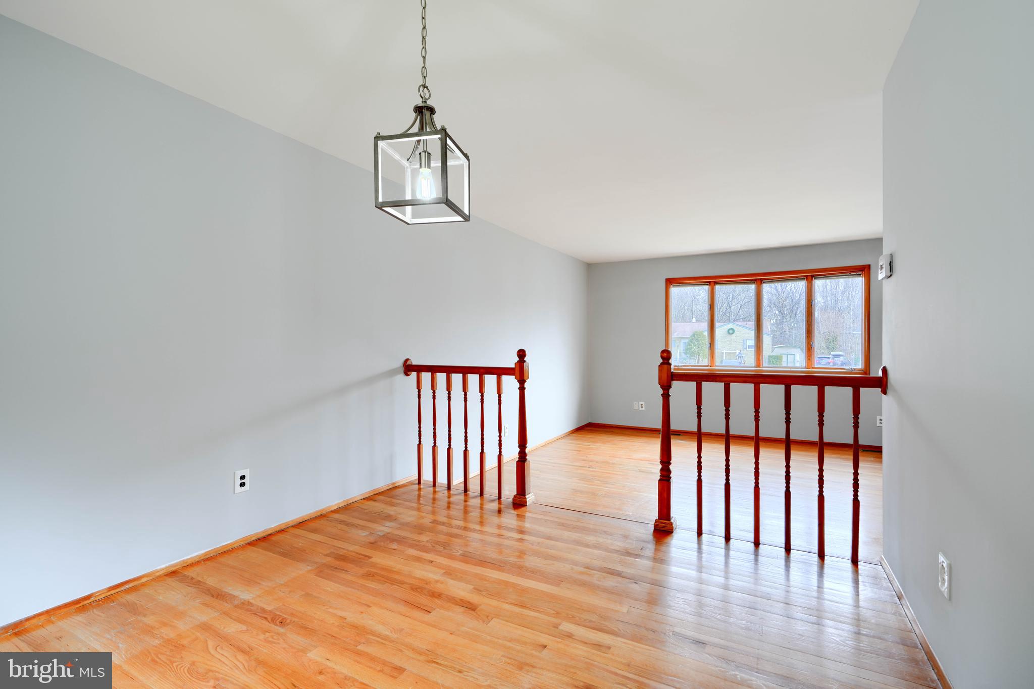 4425 Wynn Road Baltimore, MD 21236 - Photo 10 of 39 a view of a room with wooden floor and windows