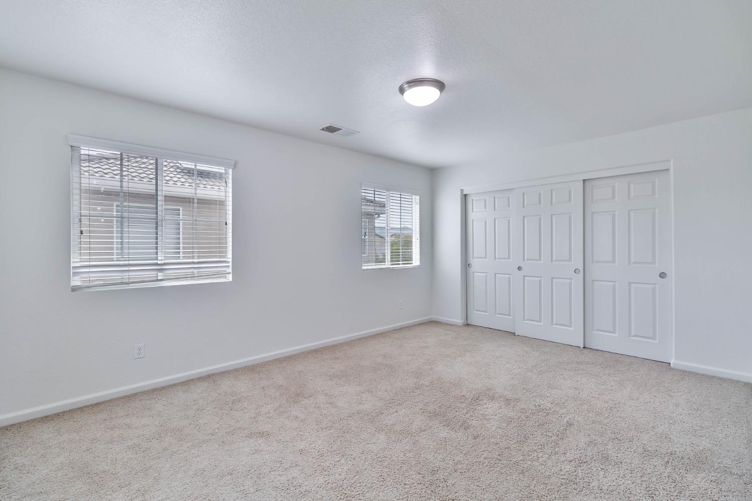 863 Chianti Circle Coalinga, CA 93210 - Photo 14 of 35 a view of an empty room with a window