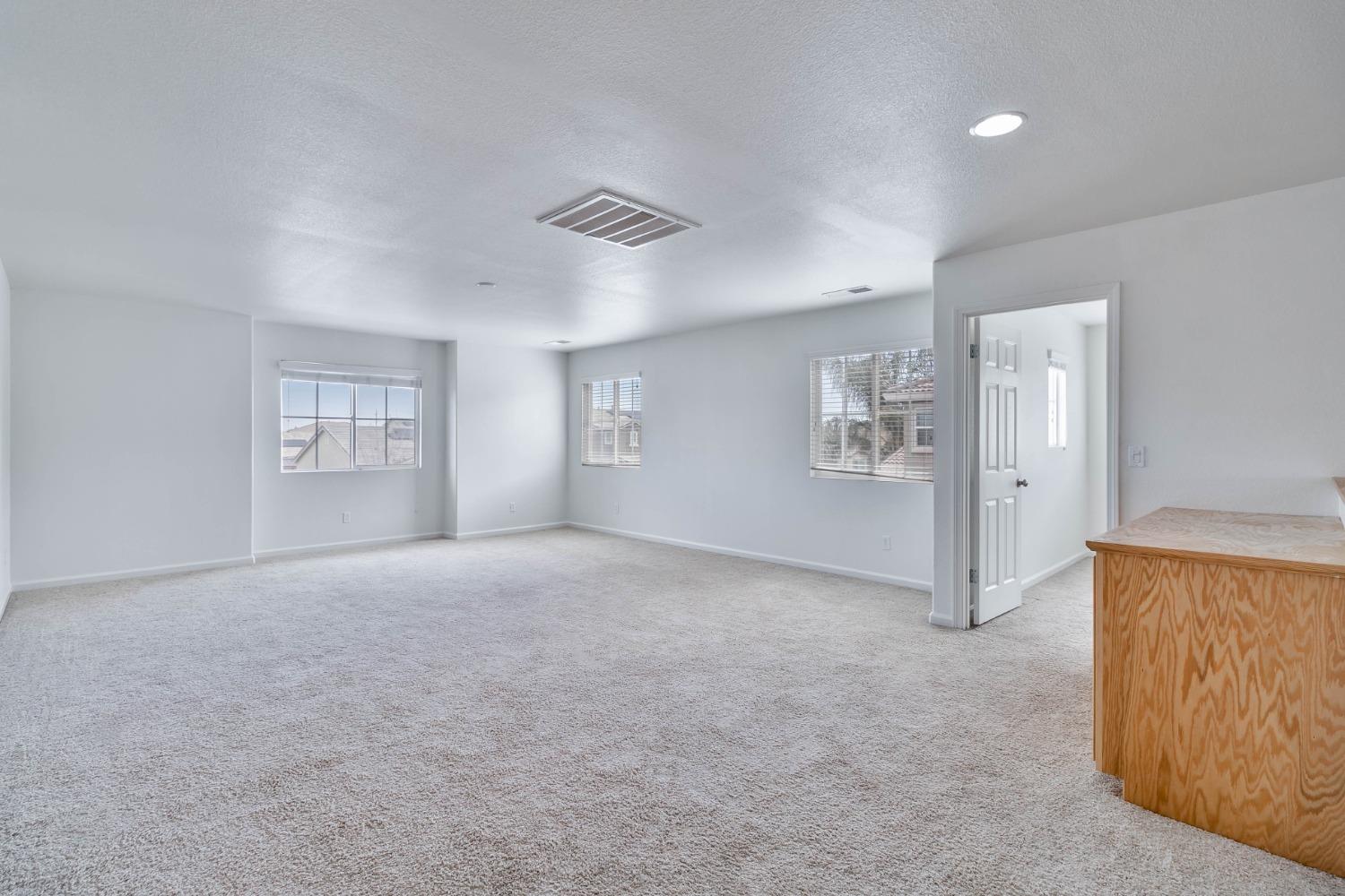 863 Chianti Circle Coalinga, CA 93210 - Photo 16 of 35 a view of an empty room with a window
