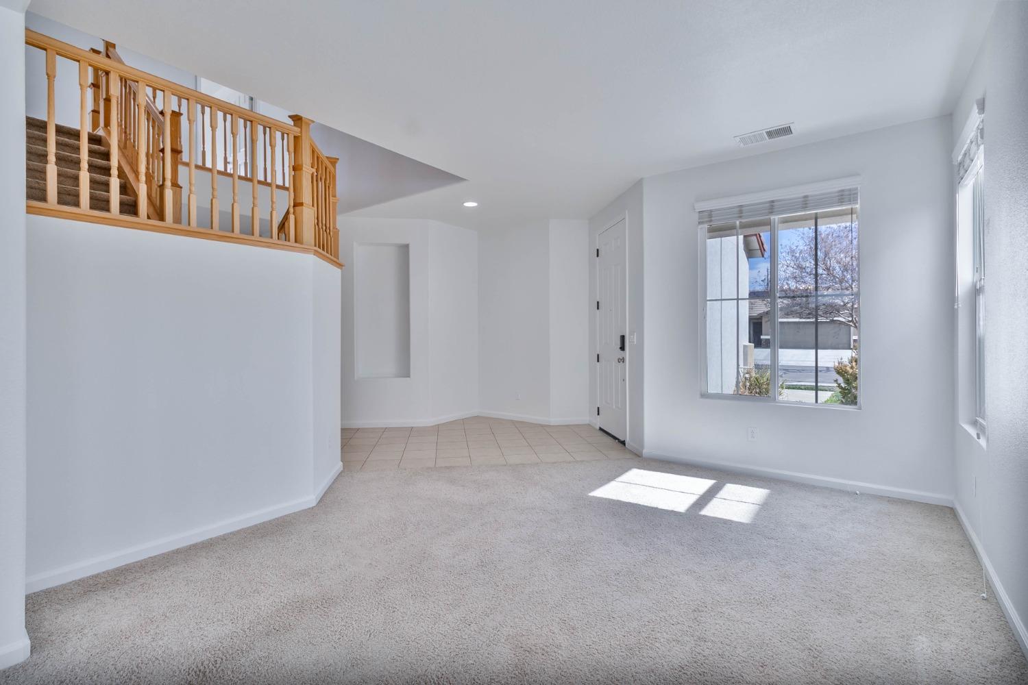 863 Chianti Circle Coalinga, CA 93210 - Photo 30 of 35 an empty room with windows