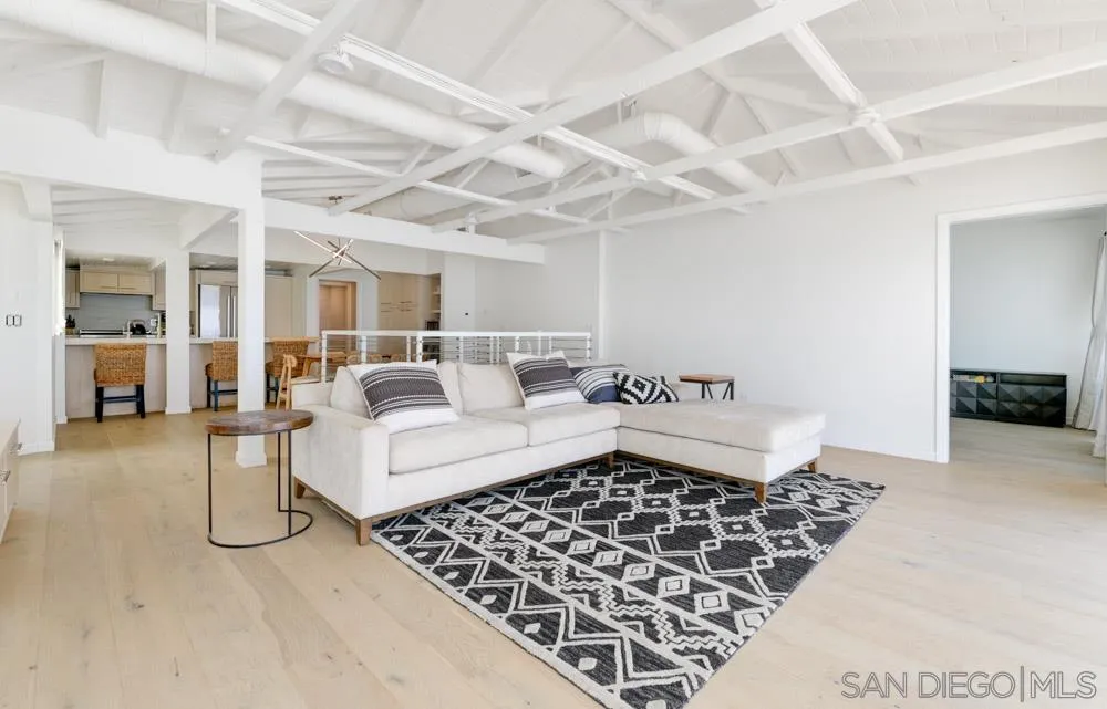 2633 Ocean Street Carlsbad, CA 92008 - Photo 13 of 23 a living room with furniture and a rug
