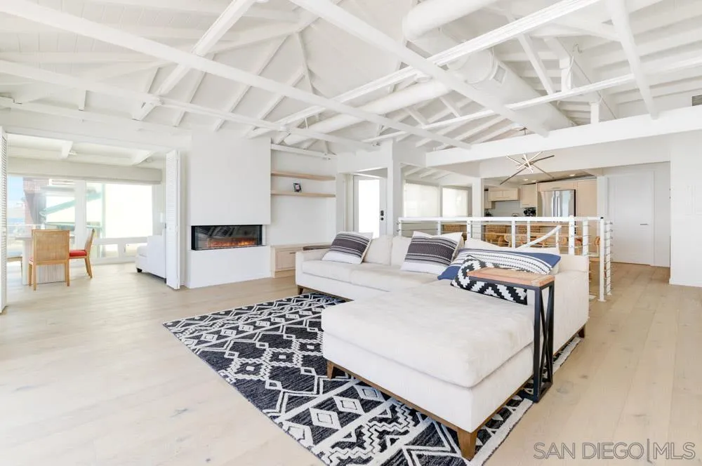 2633 Ocean Street Carlsbad, CA 92008 - Photo 14 of 23 a living room with furniture and a rug
