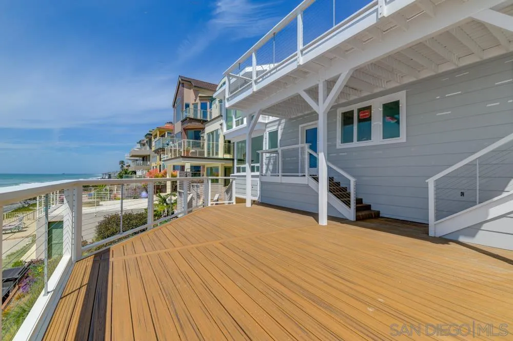 2633 Ocean Street Carlsbad, CA 92008 - Photo 20 of 23 a balcony with furniture and wooden floor