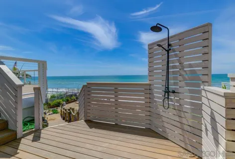 a view of a balcony with an ocean view