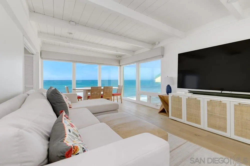 2633 Ocean Street Carlsbad, CA 92008 - Photo 5 of 23 a living room with furniture and a flat screen tv