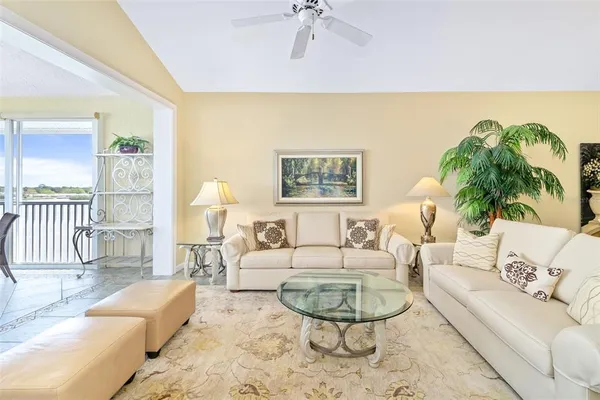 a living room with furniture and a table