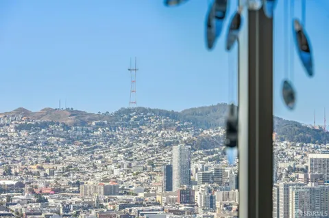a kitchen with sink and refrigerator