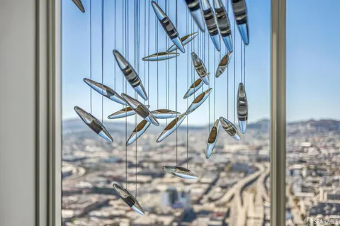 a kitchen with cabinets and stainless steel appliances