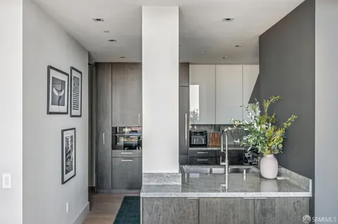 a kitchen with a stove and a microwave