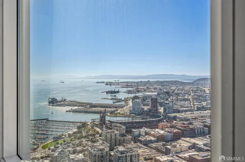 a bedroom with a bed and lamp