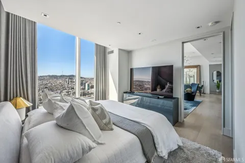 a view of a hallway with washer and dryer