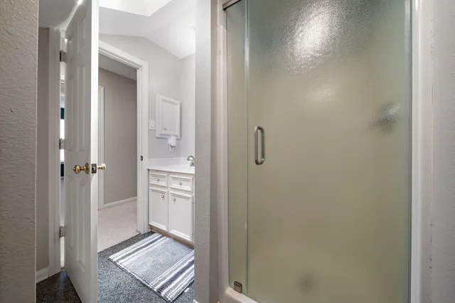 a view of room with window and ceiling fan