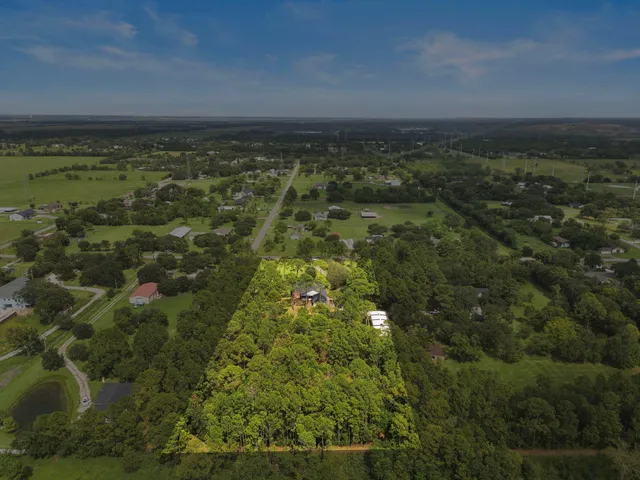 a picture of a bathroom with a shower
