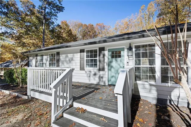 a front view of a house with a porch