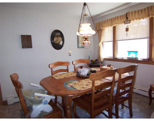 105 Baldwin Road Billerica, MA 01821 - Photo 4 of 17 a view of a dining room with furniture and window