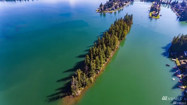 a view of a lake with a yard