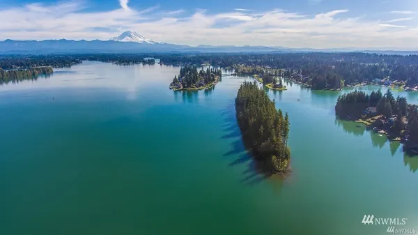 a view of a lake in middle of the town