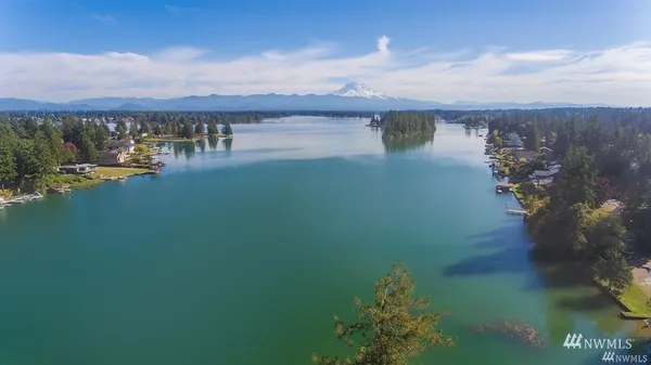 a view of a lake with a city view