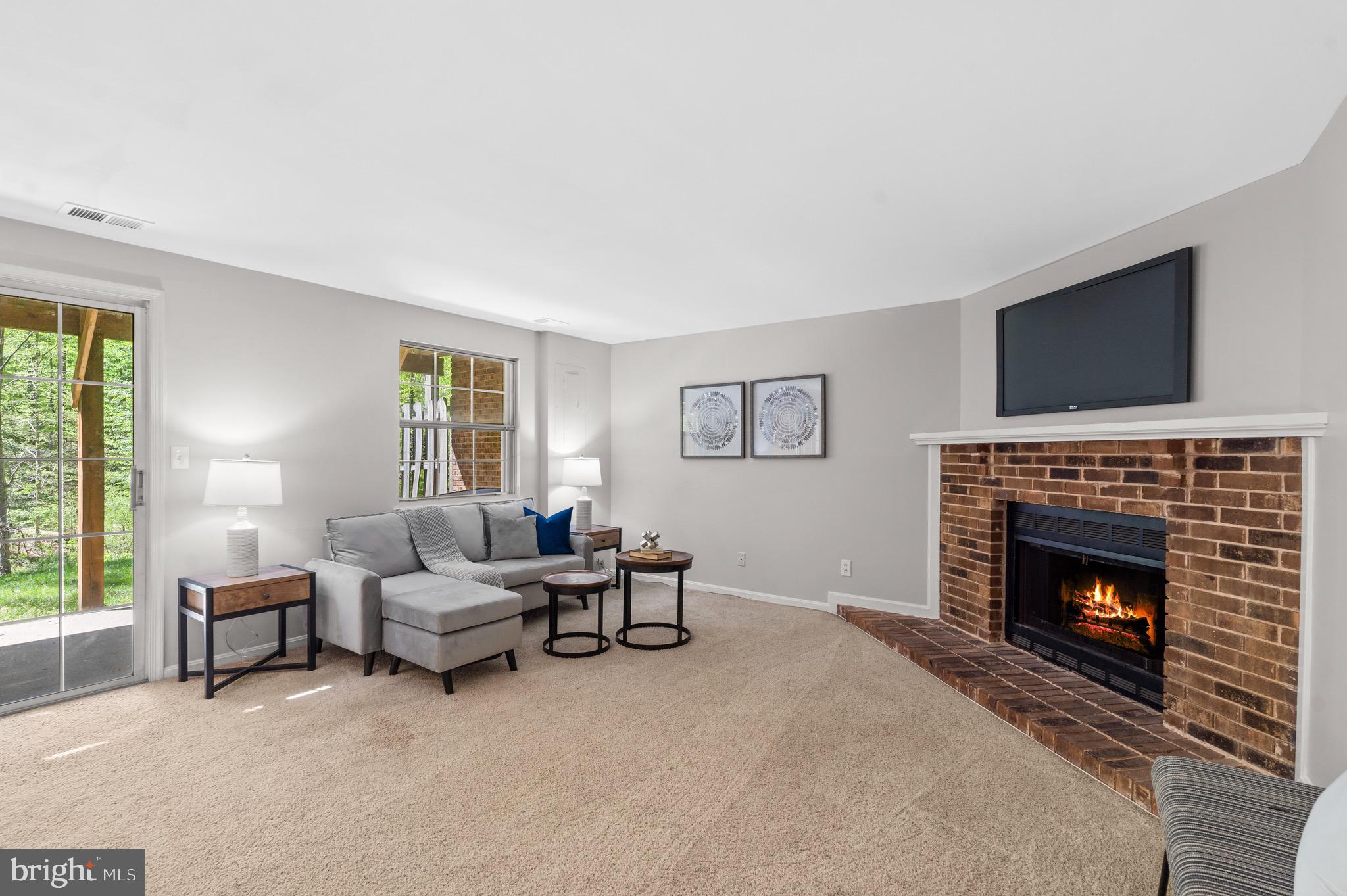 8939 Park Forest Drive Springfield, VA 22152 - Photo 33 of 48 Lower level wood burning fireplace.