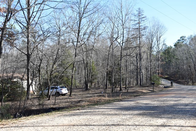 135 Taylor Road Gray, GA 31032 - Photo 3 of 28 a view of a house with a yard and trees