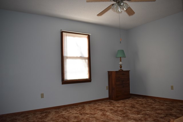 135 Taylor Road Gray, GA 31032 - Photo 21 of 28 a view of an empty room with a window