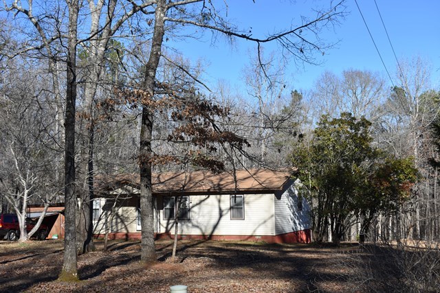 135 Taylor Road Gray, GA 31032 - Photo 24 of 28 a view of a yard with wooden fence
