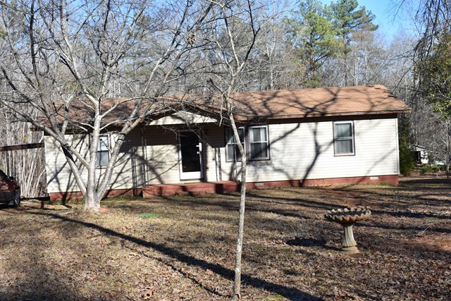 135 Taylor Road Gray, GA 31032 - Photo 28 of 28 a backyard of a house with large trees