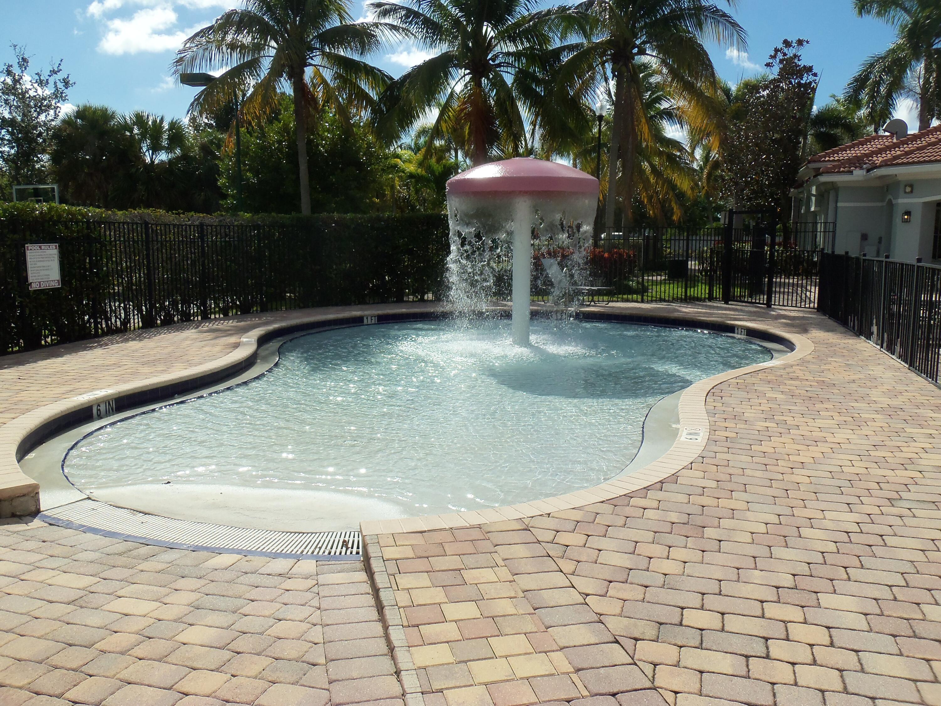 3266 Laurel Ridge Circle Riviera Beach, FL 33404 - Photo 30 of 34 Kiddie splash pool
