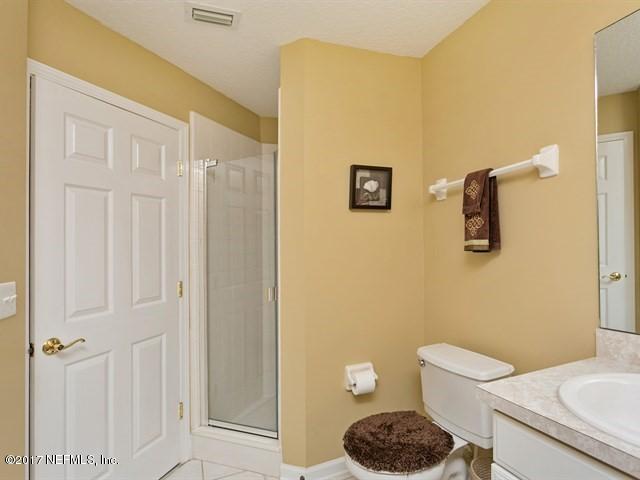 4445 Mandarin Ridge Court Jacksonville, FL 32258 - Photo 20 of 33 a bathroom with a toilet and a sink