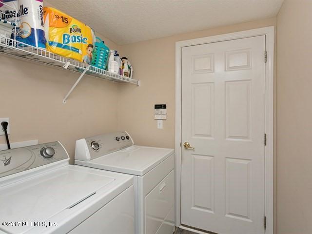 4445 Mandarin Ridge Court Jacksonville, FL 32258 - Photo 25 of 33 a utility room with dryer and washer